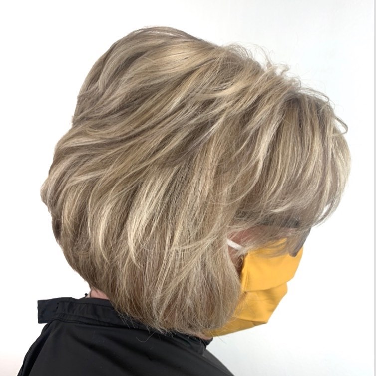 Layered Blonde Bob with Glasses