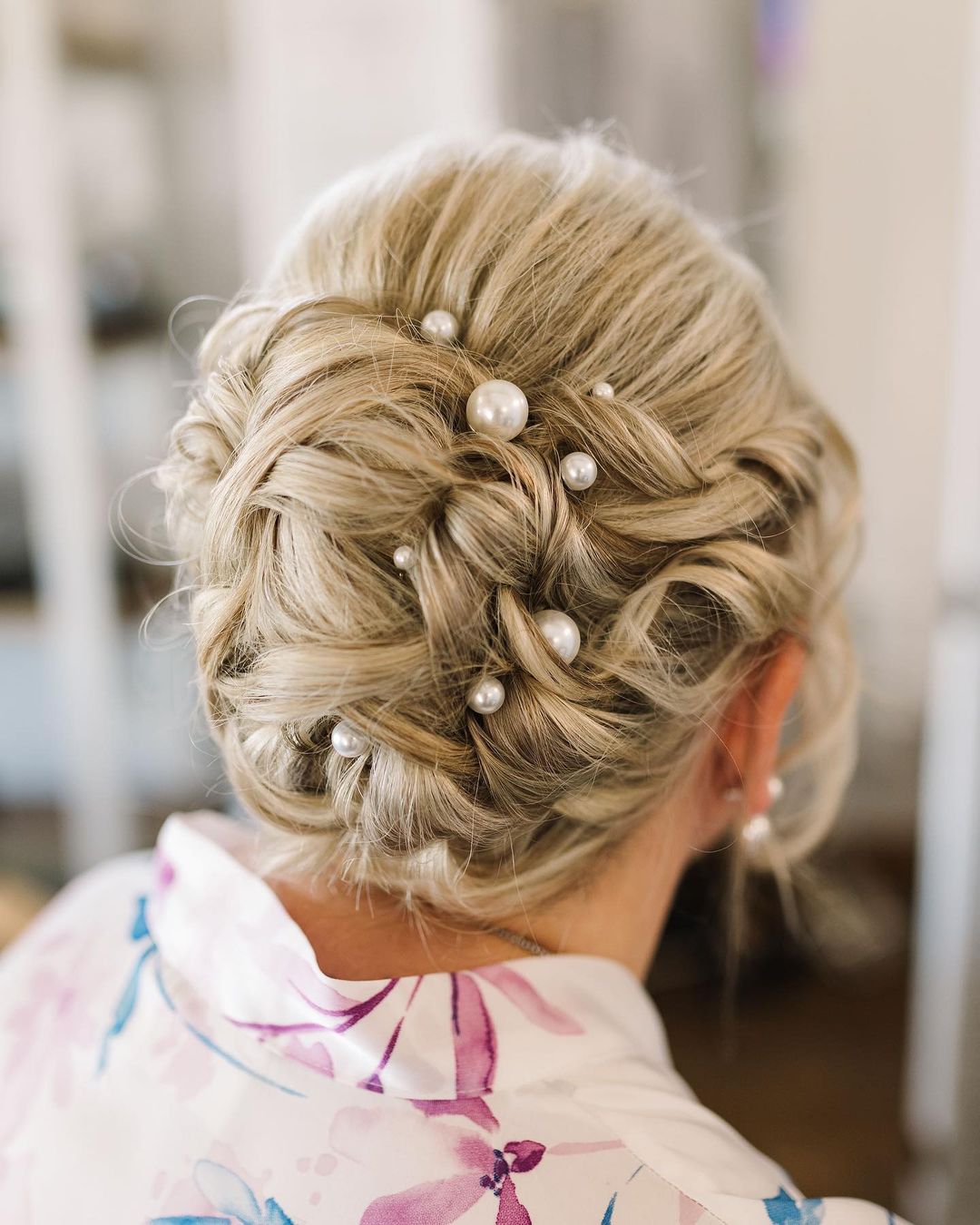 Curly Mother-of-the-Bride Upstyle with Pearls