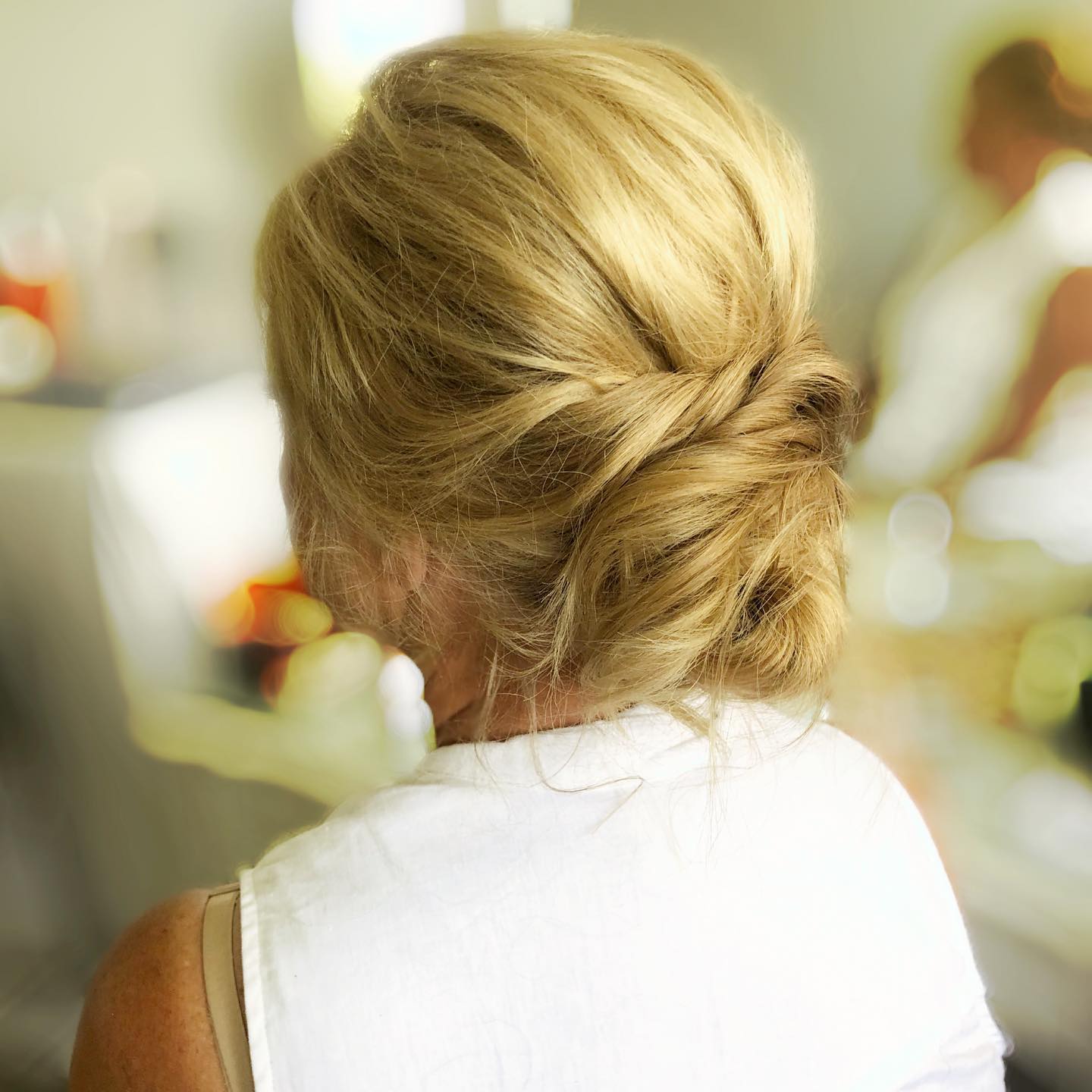 Low Messy Short Hair Updo